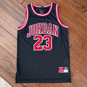 Jordan Black and Red 23 Jersey size Medium 10-12 yrs